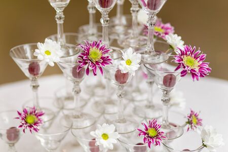 A Festive wineglasses with flowersの写真素材
