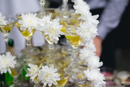 A Festive wineglasses with flowersの写真素材