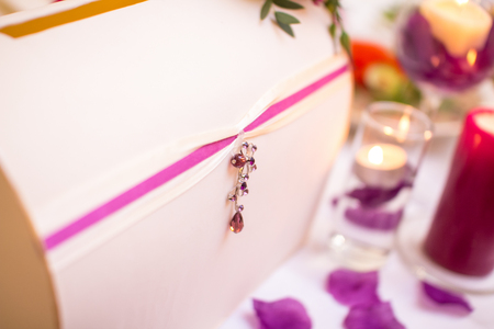 Wedding table decoration with box in lilac colorの写真素材