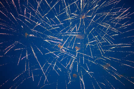 Beautiful fireworks on the black sky backgroundの写真素材