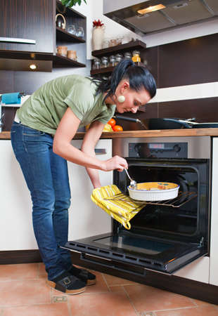 Attractive young woman during roasting 
の写真素材