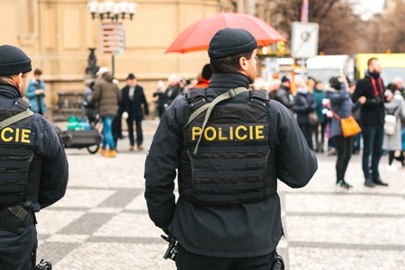 Prague, Czech Republic - December 24, 2016: The police presence at Christmas on the squares. Police patrolled the streets of the city. Strengthening of security measures during public holidays.のeditorial素材