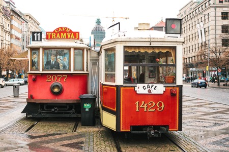 Czech Prague, December 24, 2016: Authentic unusual cafe in the form of two real old vintage trams symbolizing the meeting. Favorite place to visit by tourists. One of the unofficial sights of the cityのeditorial素材