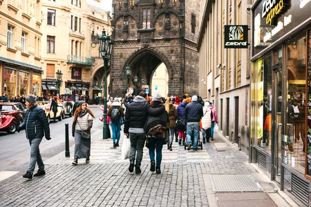 Prague, Czech Republic December 24, 2016: A couple of tourists visiting the sights. Christmas holidays in Europe.のeditorial素材