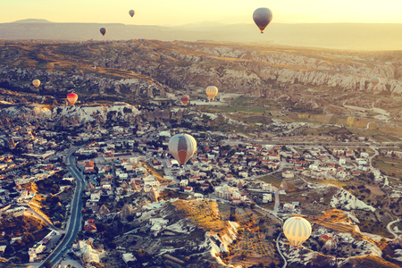 Balloon flight. The famous tourist attraction of Cappadocia is an air flight. Cappadocia is known all over the world as one of the best places for flights with balloons. Cappadocia, Turkey.の写真素材