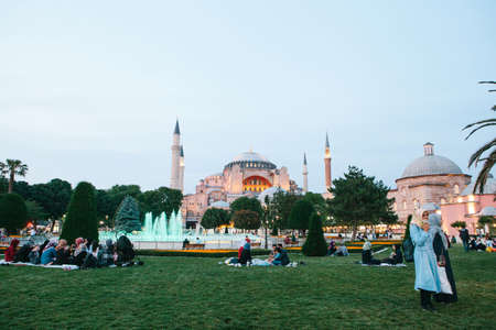 Istanbul, June 16, 2017: Many people of the Islamic religion take food on the Sultanahmet square next to the blue mosque along with their relatives at the time allowed in the Ramadan fast. Ramazan.のeditorial素材