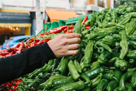 Fresh and organic vegetables at farmers market. Marketplace. Natural produce. Paprika. Pepper. Natural local products on the farm market. Harvesting. Seasonal products. Food.の写真素材