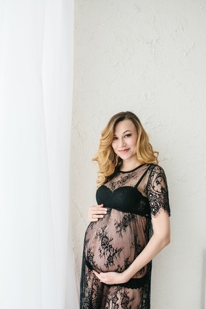 Beautiful adult pregnant womanの写真素材