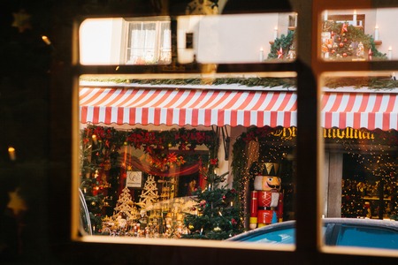 Germany, Rothenburg ob der Tauber, December 30, 2017: The Nutcracker. A stylish photo made through the car window. Kathe Wohlfahrt Christmas decorations and toy shop. A popular toy store in Germany.のeditorial素材