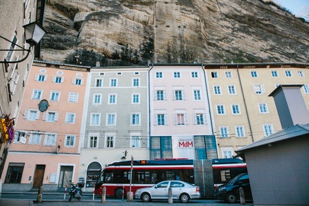 Austria, Salzburg, January 1, 2017: Traditional Austrian multicolored houses in the rock in...