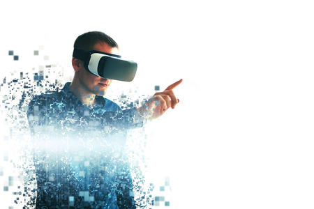 A person in virtual glasses flies to pixels. The man with glasses of virtual reality. Future technology concept. Modern imaging technology. Fragmented by pixels.の写真素材