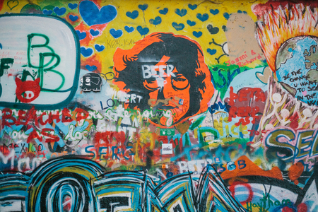 Prague, December 14, 2016: The Wall of John Lennon. Graffiti on the wall. A famous place. Sightseeing for fans. Memory of the Beatles. Europe.のeditorial素材