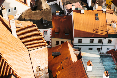A view from the air to beautiful authentic houses and streets in the town of Cesky Krumlov in the Czech Republic. One of the most beautiful small towns in the world. Europe.の写真素材