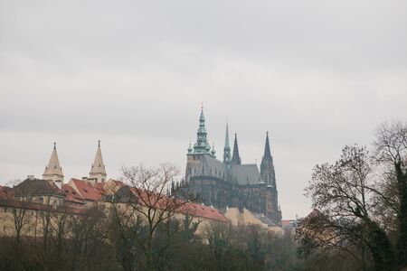 Architecture of Prague. View of beautiful old buildings and cathedral in Pragues square in the...