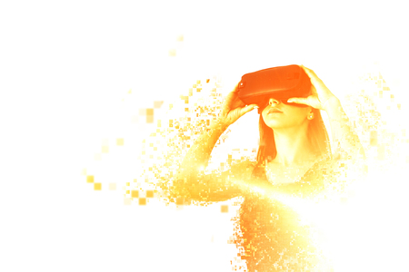 A person in virtual glasses flies to pixels. The woman with glasses of virtual reality. Future technology concept. Modern imaging technology. Fragmented by pixels.の写真素材