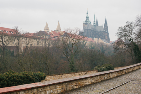 Architecture of Prague. View of beautiful old buildings and cathedral in Pragues square in the winter timeの写真素材