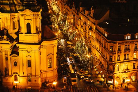 View of the Church of St. Nicholas and street. Night Christmas Decoration of Pragues main square. Street, open area. Christmas in Europe. New Year holidays.の写真素材