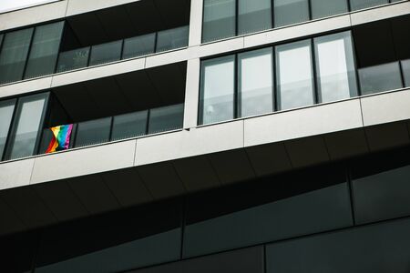 Rainbow flag. Multi-colored flags on a house in Berlin in Germany. European sexual revolutionの写真素材