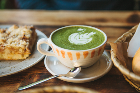 Close-up ceramic cup with green tea called Matchaの写真素材