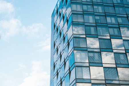 View of the beautiful modern futuristic building. Business concept of successful industrial...