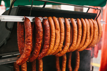 Sale of sausages in the market. European traditions. Street Food Festival.の写真素材