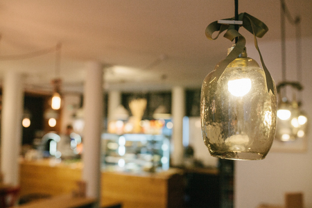 Decorative modern lamps in a cafe. Selective focus.の写真素材