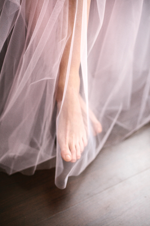 Young woman in a beautiful boudoir. Morning of the bride.の写真素材