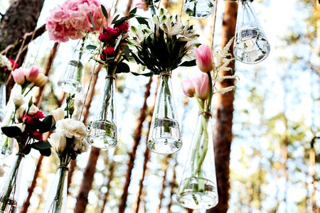 Wedding flowers decoration arch in the forest. The idea of a wedding flower decoration.の写真素材