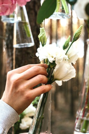 Wedding flowers decoration arch in the forest. The idea of a wedding flower decoration.