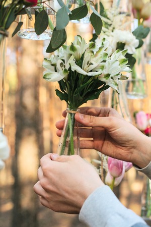Wedding flowers decoration arch in the forest. The idea of a wedding flower decoration.の写真素材