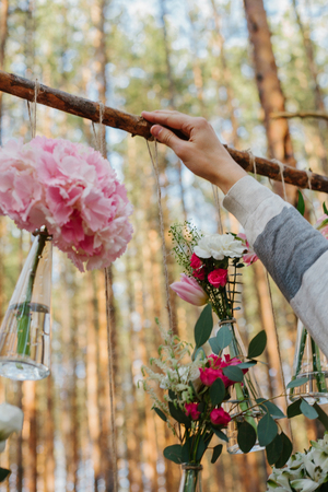 Wedding flowers decoration arch in the forest. The idea of a wedding flower decoration.の写真素材