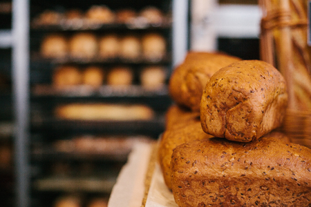 Fresh bread from cereals with seeds from a bakery. Healthy and nutritious food.の写真素材