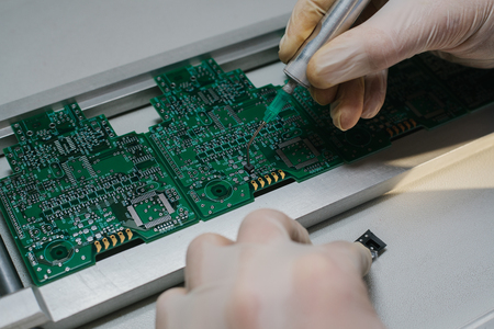 The assembly of computer units. Technological process.の写真素材