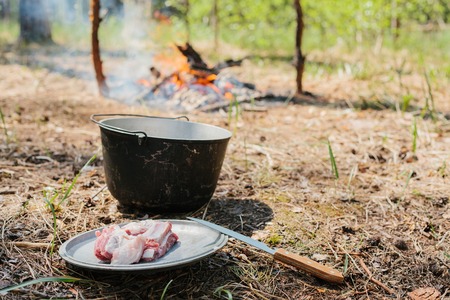 Cooking in the forest. Camping. Journey into the wildの写真素材