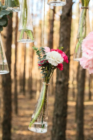 Wedding flowers decoration arch in the forest. The idea of a wedding flower decoration.の写真素材