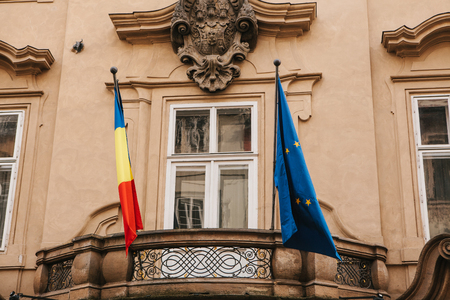 The flag of the European Union and the flag of Italy on the building of the Italian Embassy in Prague in the Czech Republicの写真素材