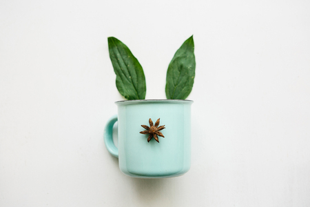 The creative idea of a mug with ears is similar to a rabbit or a hare or a Christmas rabbitの写真素材