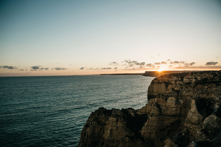 Atlantic oceans and a beautiful sunset off the coast of Portugal.の写真素材