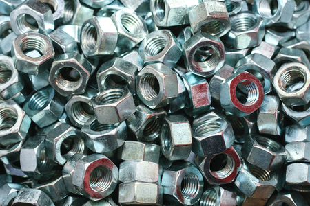 Close-up of a lot of bolts for fixing. Construction background.の写真素材