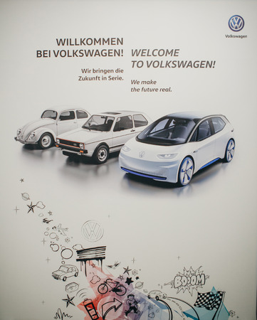 Berlin, August 29, 2018: Photo image of the new concept car from Volkswagen and next to it old or retro model cars presented at the official Auto Show Drive - Volkswagen Group Forum in Berlin.のeditorial素材