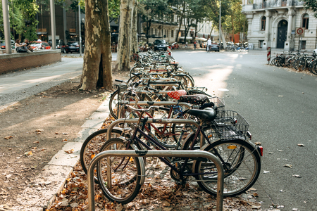 Germany, Leipzig, September 3, 2018: Many bicycles are parked in a row on Leipzig Street. Autumn. Ecological transport and a popular means of transportation in Europe.のeditorial素材