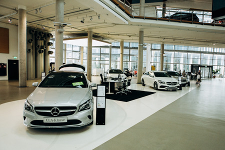 Berlin, August 29, 2018: Exhibition and sale of new cars in the official dealer center Mercedes-Benz in Berlin. A world-famous German company specializing in the production of luxury cars.のeditorial素材