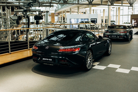 Berlin, August 29, 2018: Exhibition and sale of new cars in the official dealer center Mercedes-Benz in Berlin. A world-famous German company specializing in the production of luxury cars.のeditorial素材