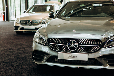 Berlin, August 29, 2018: Exhibition and sale of new cars in the official dealer center Mercedes-Benz in Berlin. A world-famous German company specializing in the production of luxury cars.のeditorial素材