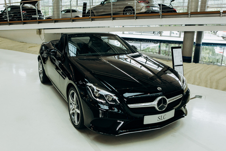 Berlin, August 29, 2018: A close-up of the new black cabriolet Mercedes-Benz SLC. Exhibition and sale of new cars in the official dealer center Mercedes-Benz in Berlin.のeditorial素材