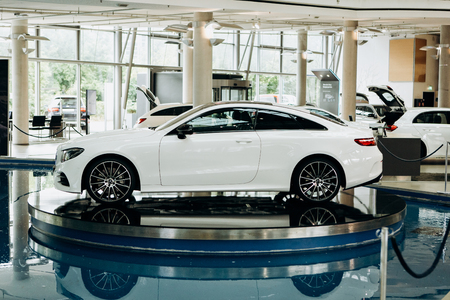 Berlin, August 29, 2018: Exhibition and sale of new cars in the official dealer center Mercedes-Benz in Berlin. A world-famous German company specializing in the production of luxury cars.のeditorial素材