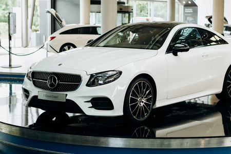 Berlin, August 29, 2018: Exhibition and sale of new cars in the official dealer center Mercedes-Benz in Berlin. A world-famous German company specializing in the production of luxury cars.のeditorial素材