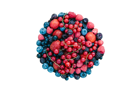 Many different berries isolated on white background.