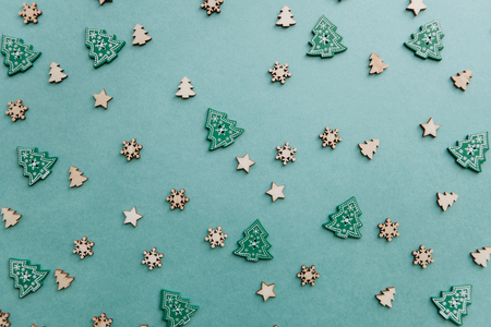 Creative idea in minimalistic style for Christmas or New Year themes. Small wooden Christmas trees...