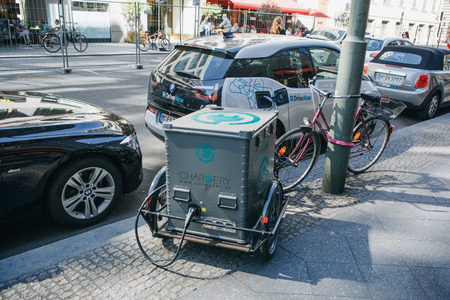 Berlin, August 29, 2018: Portable street electric filling station for electric car refueling. Eco-friendly mode of transport.のeditorial素材